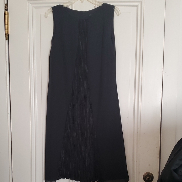 Ursula of Switzerland Elegant Black Sleeveless Dress with Plisse Patel in Front